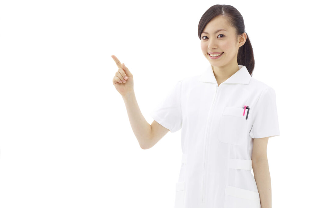 案内する歯科衛生士