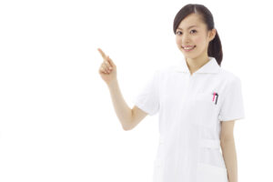 案内する歯科衛生士